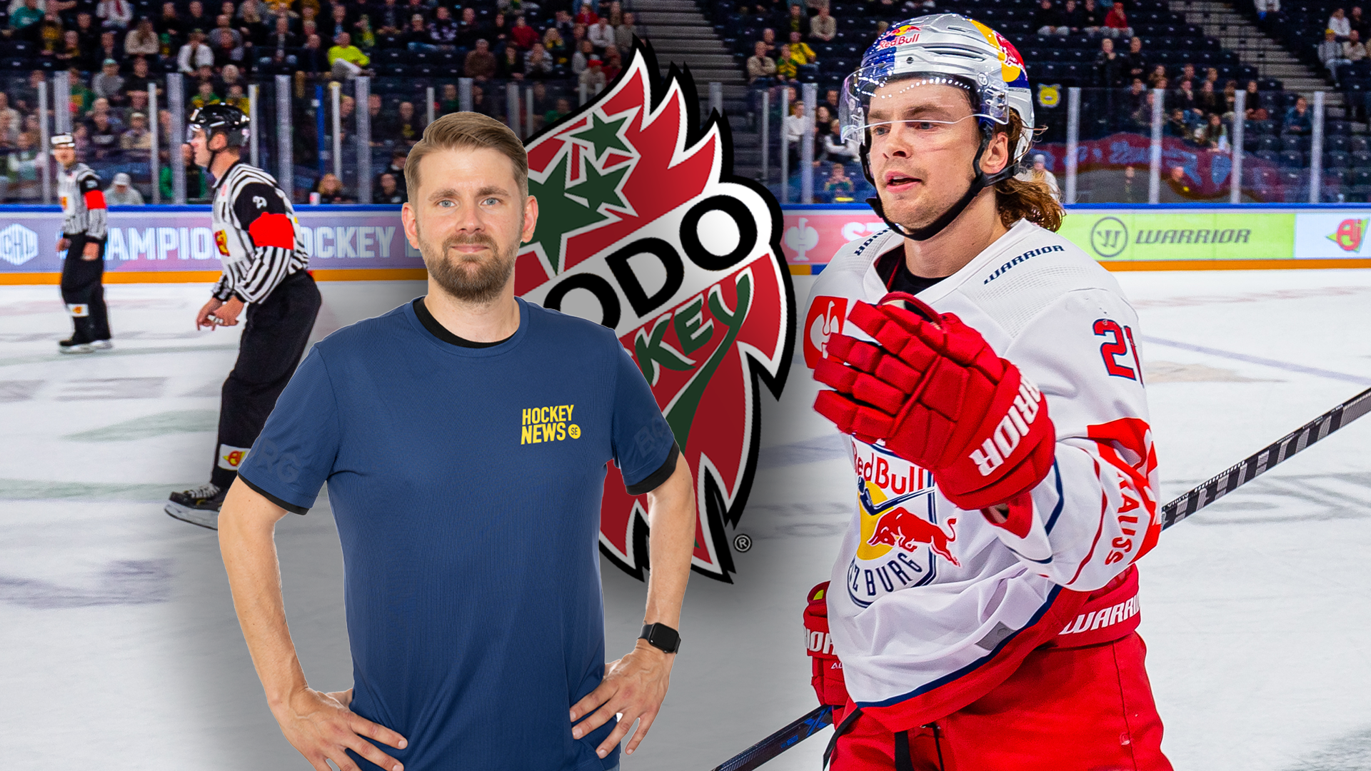 En man i mörkblå tröja står på en ishockeyarena bredvid en ishockeyspelare i röd och vit uniform. I bakgrunden syns en stor röd och grön logotyp och åskådare på läktaren.
