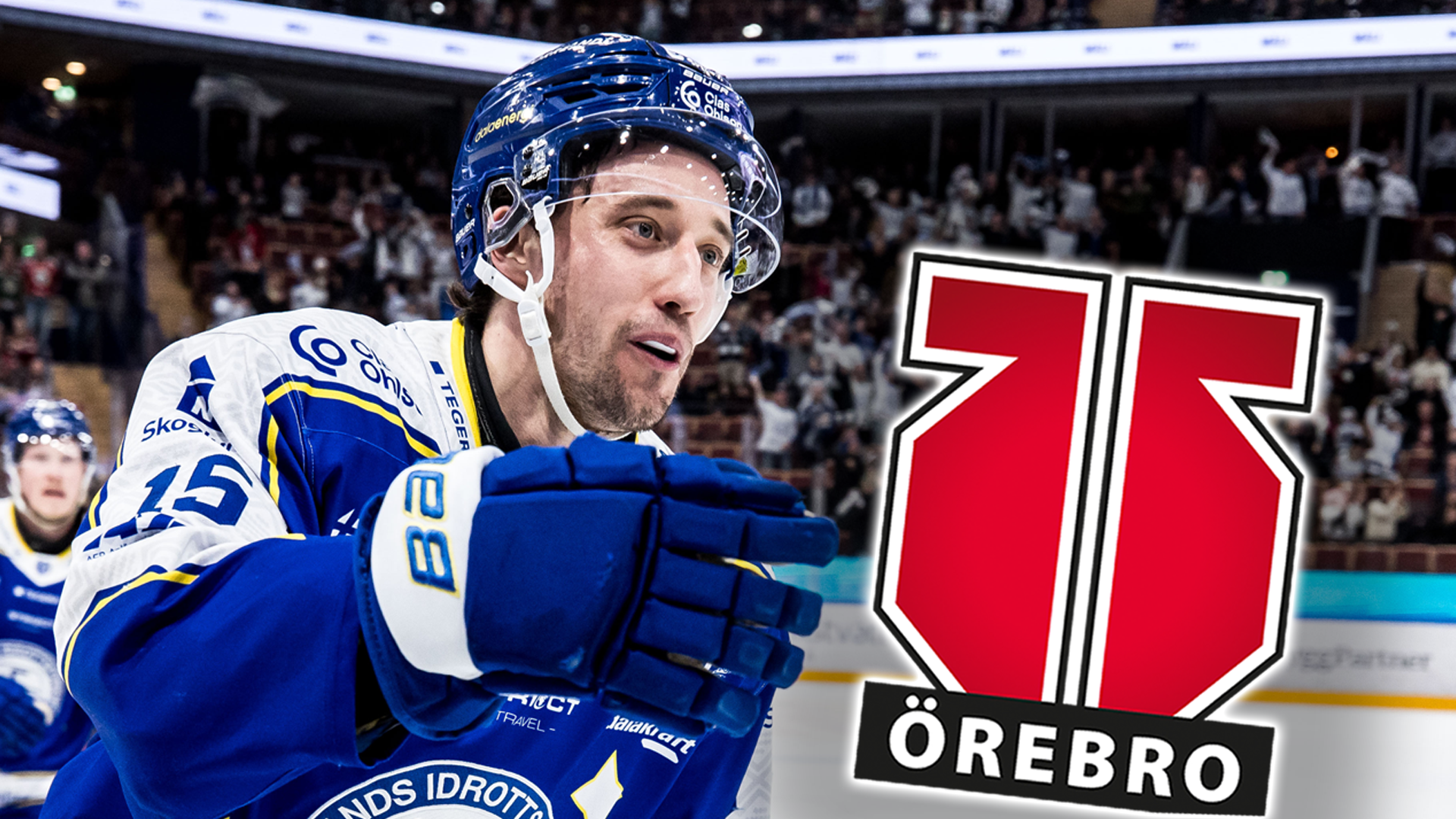 Hockeyspelare i blå Örebro-tröja under en match med publik i bakgrunden.
