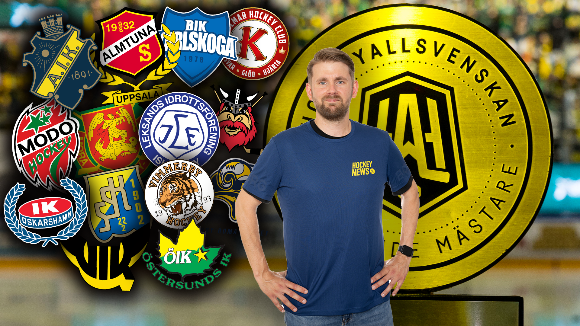 En man i mörkblå t-shirt står framför en samling svenska ishockeylagors logotyper och en stor gul cirkelformad emblem för Växjö Lakers.