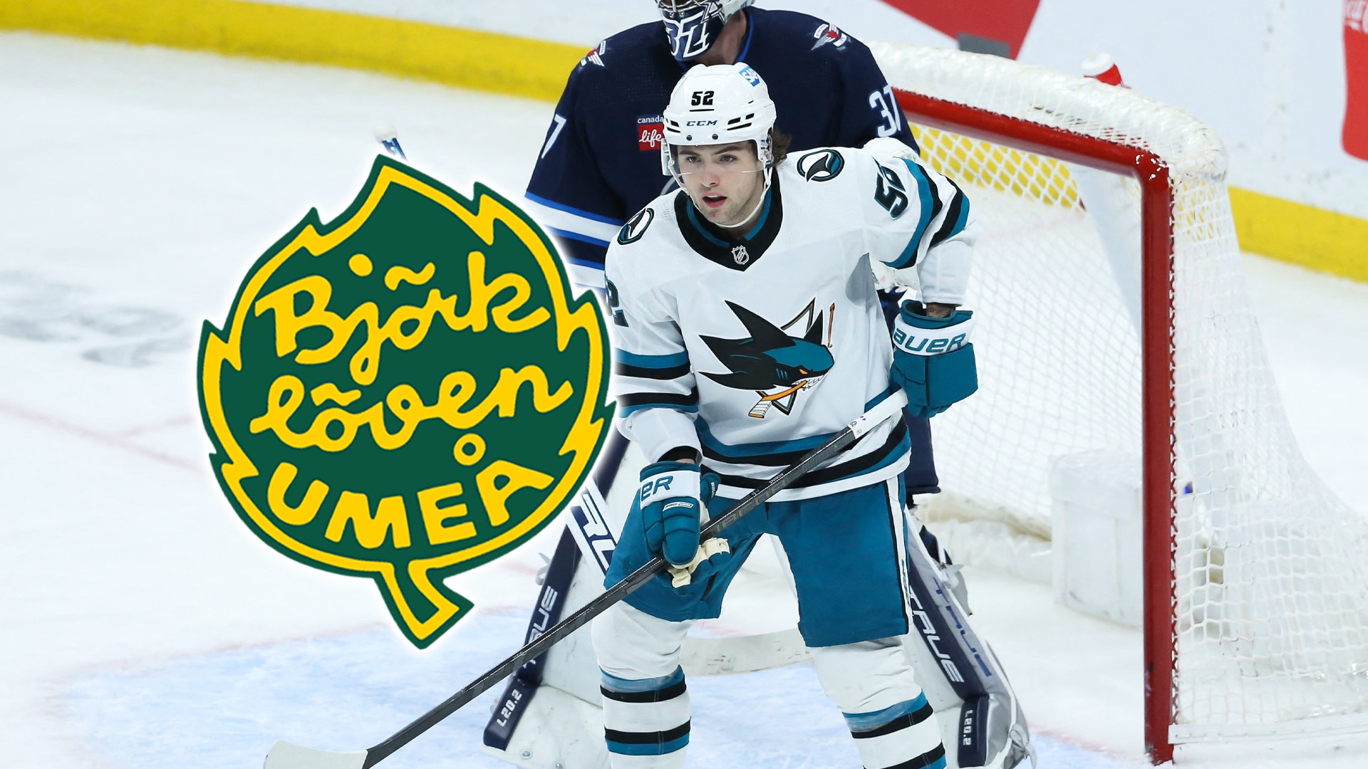 Hockeyspelar i San Jose Sharks-tröja på isen med hockeyklubbans logga.