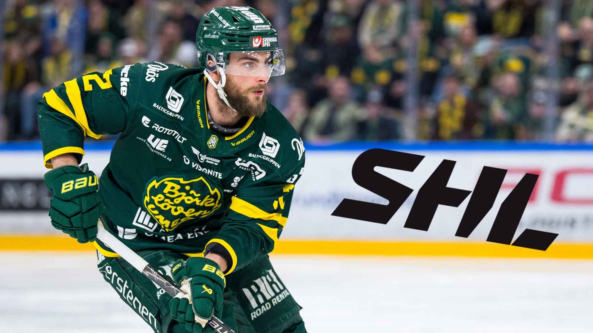Ishockeyspelare i grön och gul uniform under en match på isen.