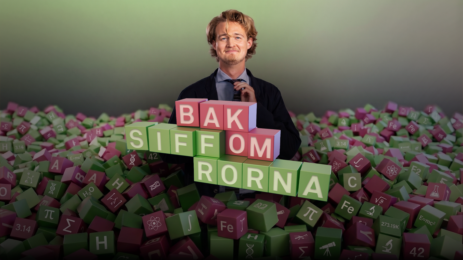 Man i svart kavaj står bland färgglada kemiska element-kuber och håller upp skyltar med texten Bakom siffrorna.