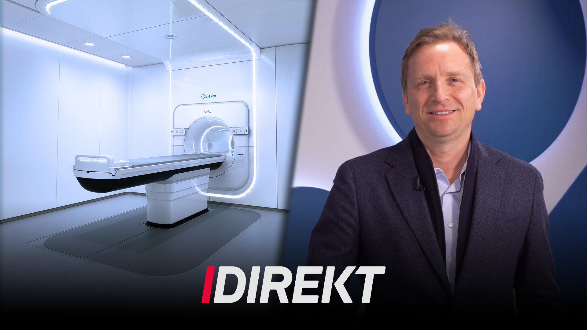 Porträtt av en man i mörkblå kavaj framför en modern MRI-maskin i ett ljust medicinsk miljö.