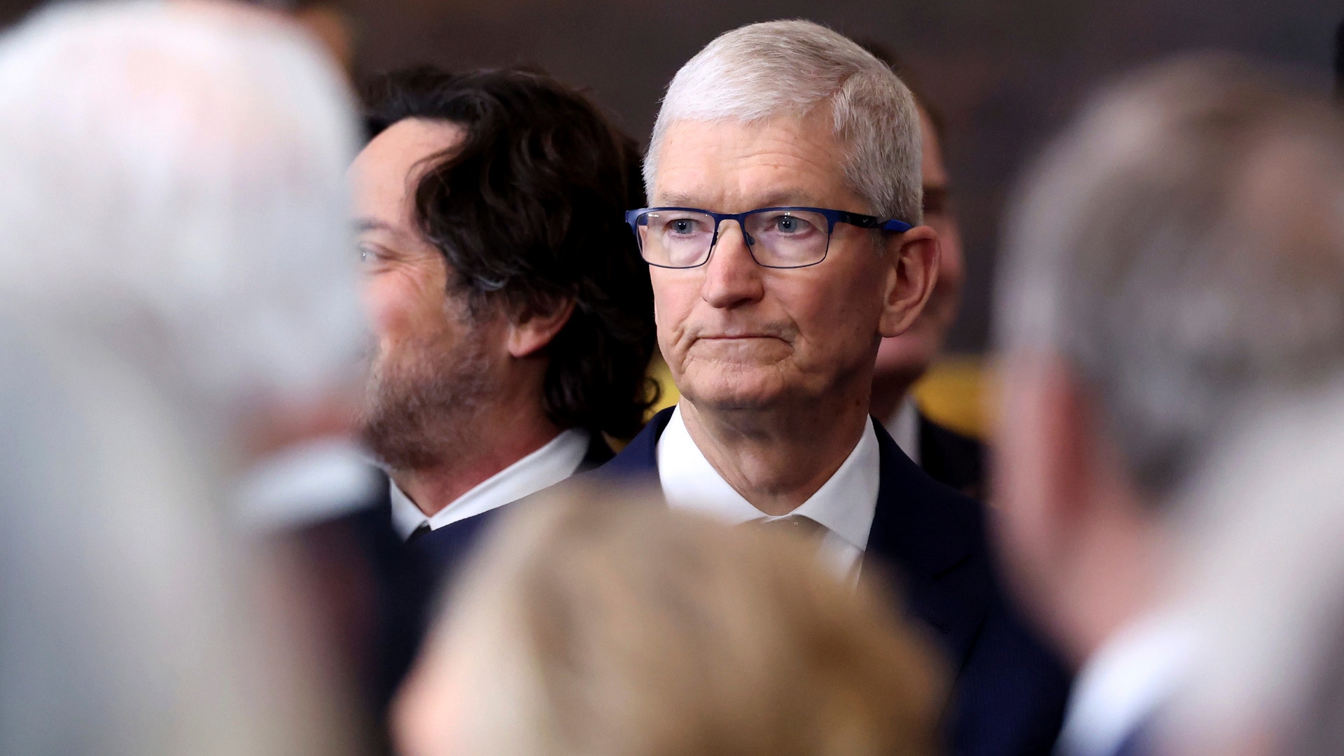 Apples vd Tim Cook vid Donald Trumps installationsceremoni i januari i år.