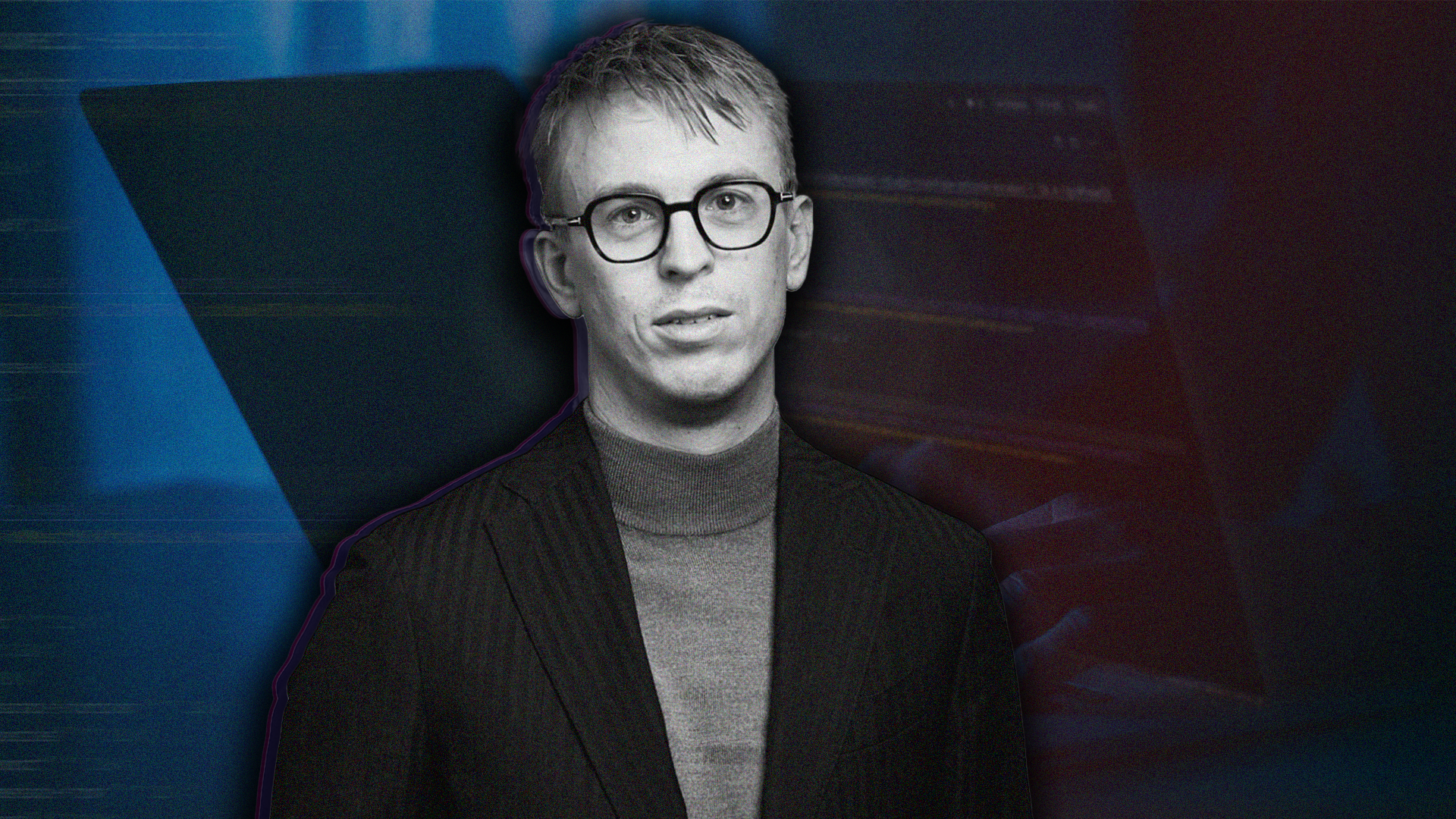 Porträtt av en person med glasögon och formell klädsel mot vit bakgrund