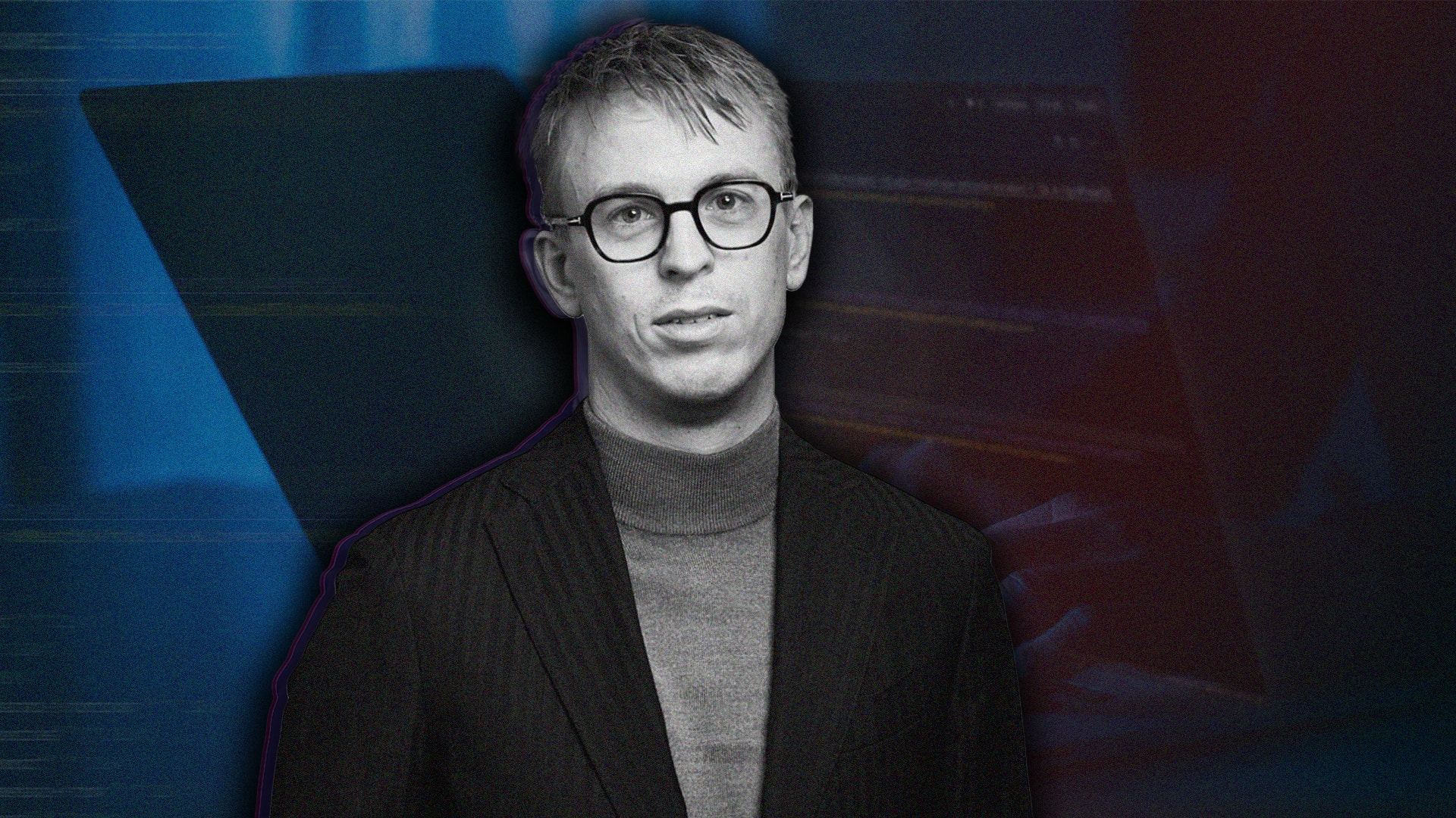 Porträtt av en person med glasögon och formell klädsel mot vit bakgrund