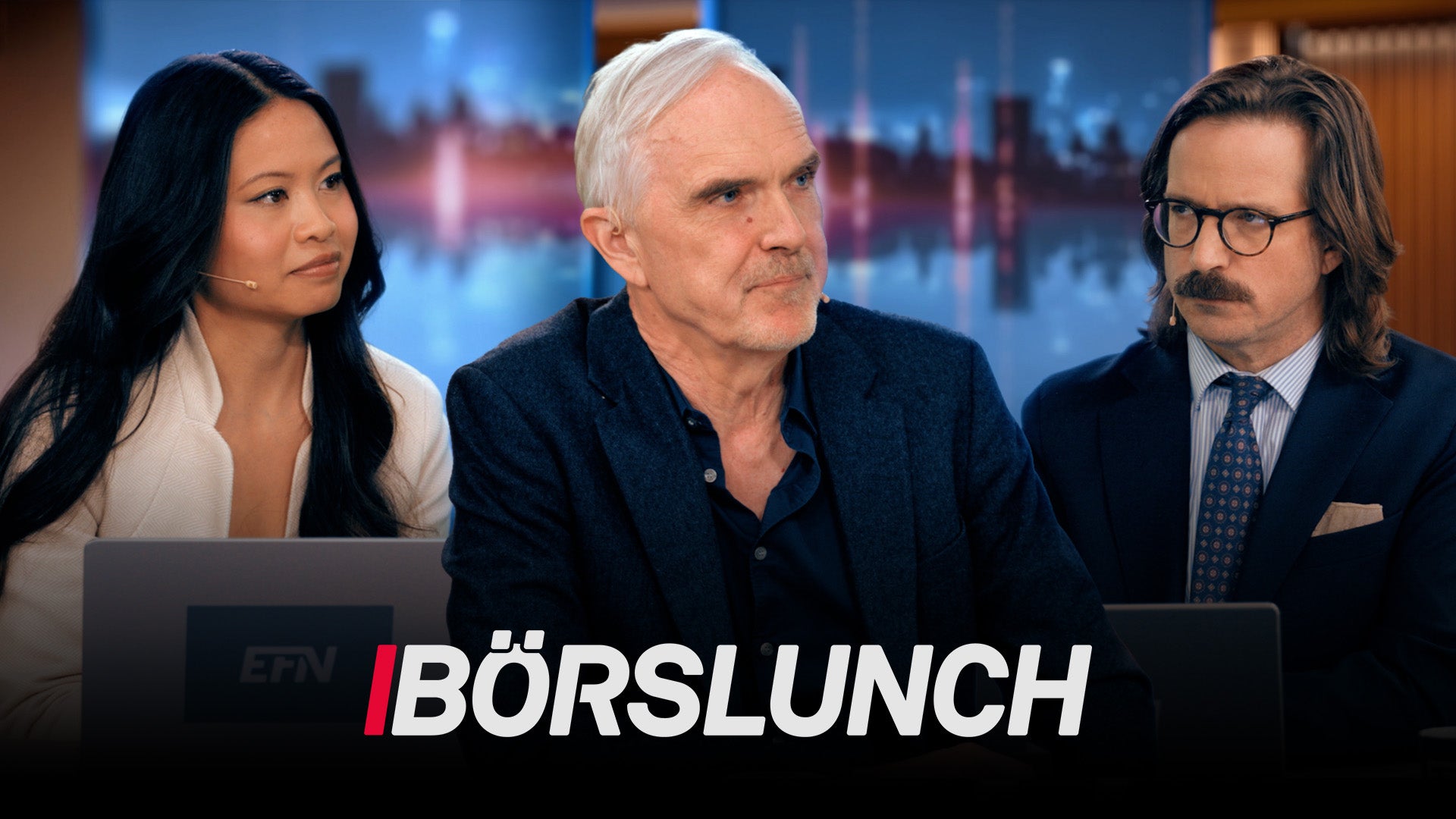 Tre personer sitter vid ett bord i en TV-studio. Texten Börslunch visas längst ned på skärmen.