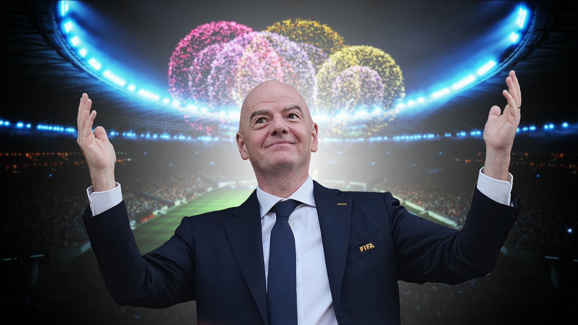 Man i kostym med FIFA-märke står i fotbollsstadion med armarna upphöjda. Ovanför honom syns glödande ljusbollor i rosa, gult och blått.