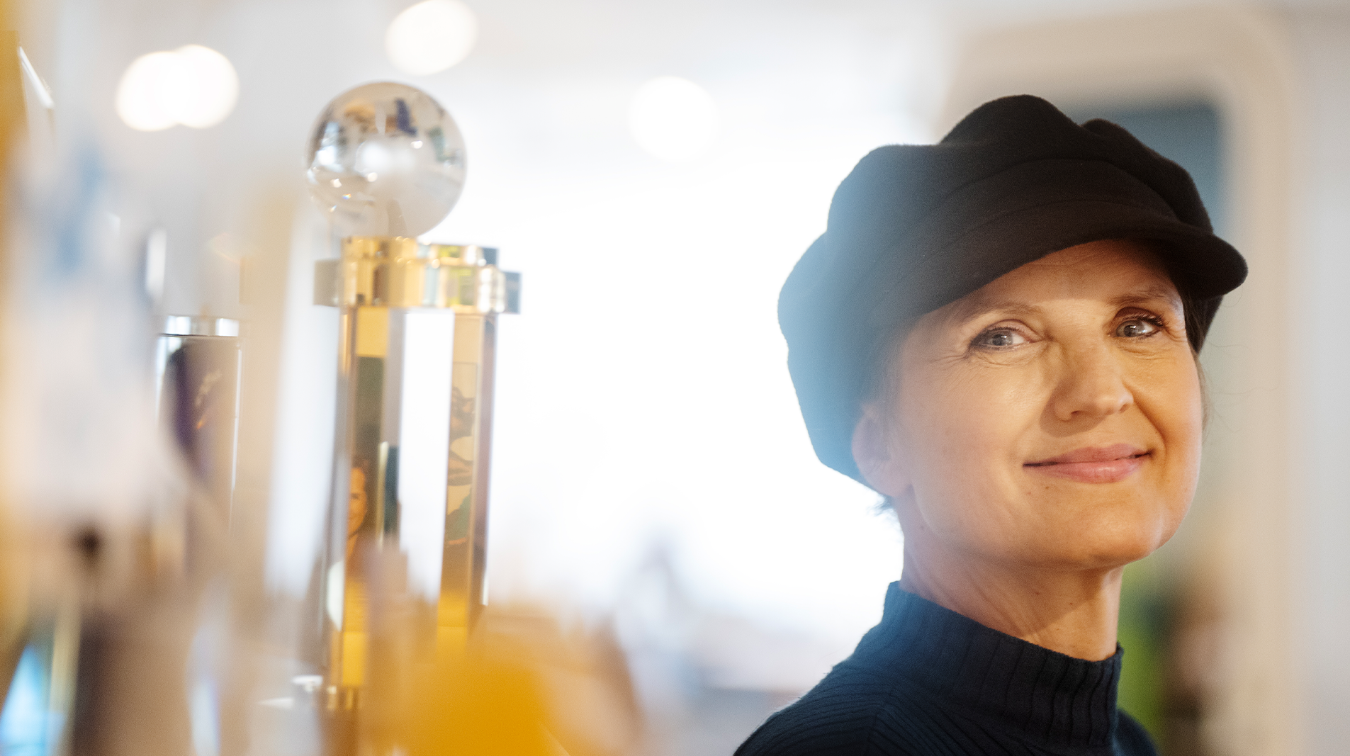 Stina Ehrensvärd framför priserna på hennes kontor. 