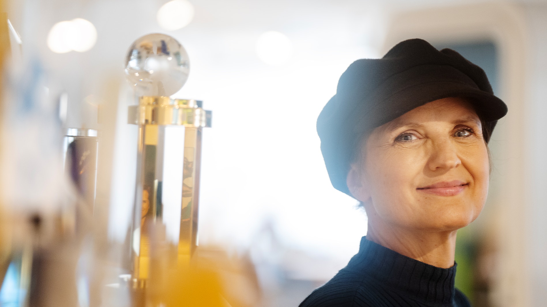 Stina Ehrensvärd framför priserna på hennes kontor.